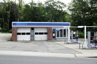 Gas Station with 4 Pumps and 2 Bay Garage Shop for Sale