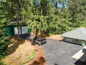 5 Car Garage and 2,400 sf Shop with this Super Nice House on 5 plus Acres