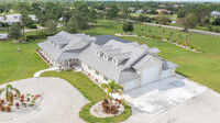 5 Car Garage House in Palm City (includes a 2023 C8 Corvette)