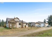 Light Fixer Upper with 4 Car Garage and 5 Acres of Flat Land