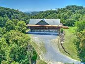 6 Car Garage with a House and a 4,400 sf Building all Designed to be Self Sustainable