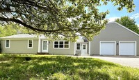 Cape Cod Ranch with 6 Car Garage!