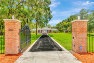 Florida House with a 12-Car Garage, Guest Suite and Pool on 10 Acres. 