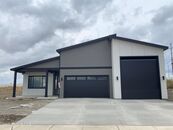 RV Garage and Room for Multiple Vehicles in this New House