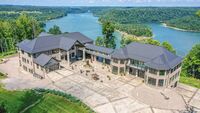 Luxury Lake View Estate on 63 Acres with Commercial Style Shop and Garage
