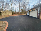 Long Driveway and 6 Car Garage