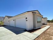 Welcome to this Oversize 4 Car Garage House with No HOA