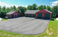 15 Car Garage at least, goes with this Incredible House and Property .. Indoor Pool and Acreage Go With It