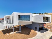 Modern House with a 4 Car Garage and Views